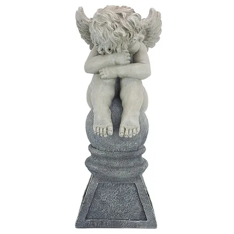 Balancing a Dream Cherub Garden Statue