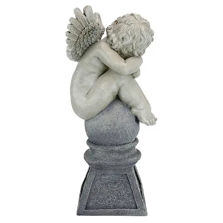Balancing a Dream Cherub Garden Statue