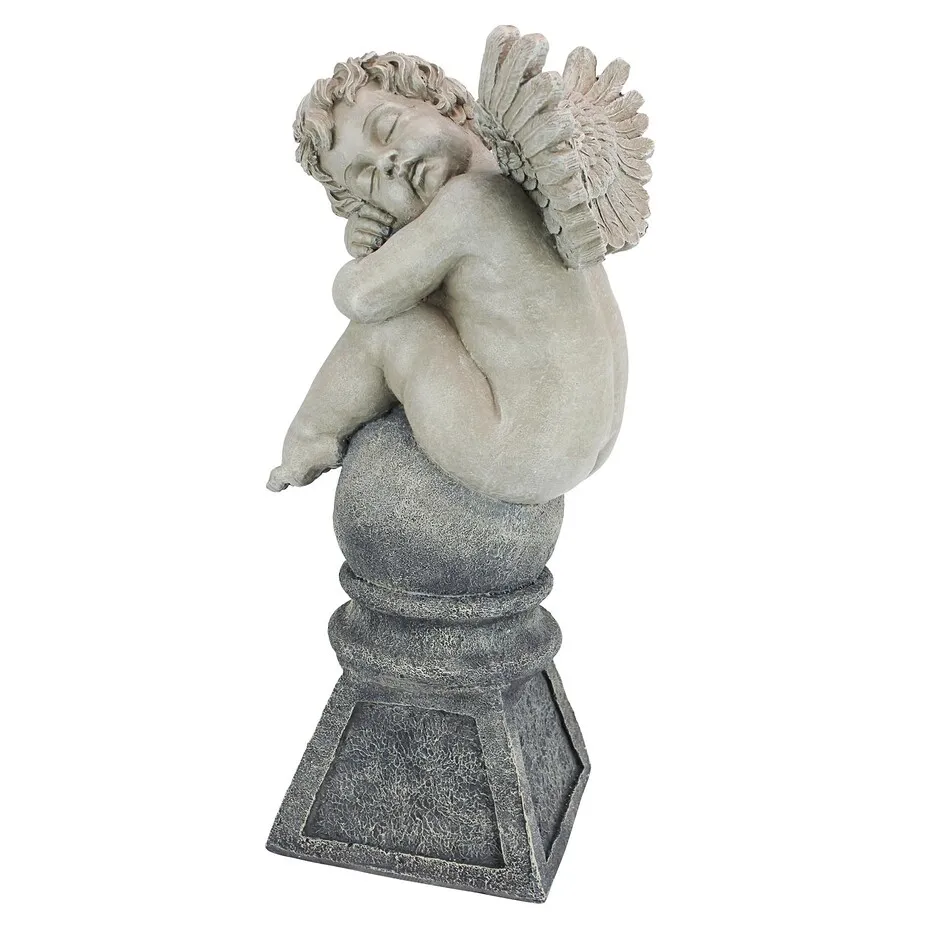 Balancing a Dream Cherub Garden Statue