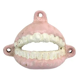 False Teeth Cast Iron Bottle Opener